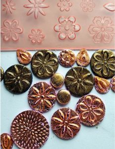 Metallic Foils with my Flora texture sheet.